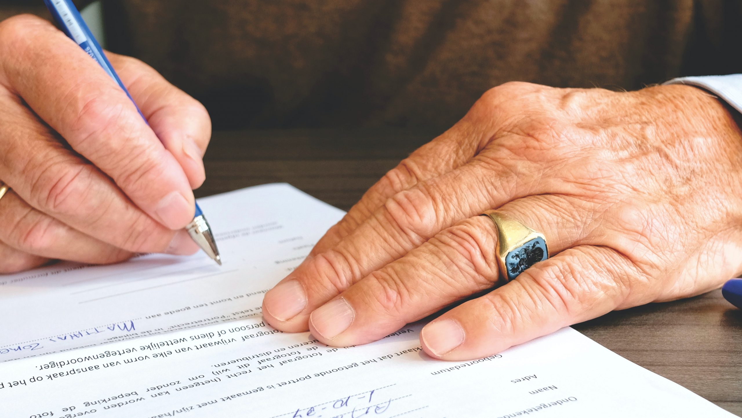 Medico Legal Assessment - person signing a document